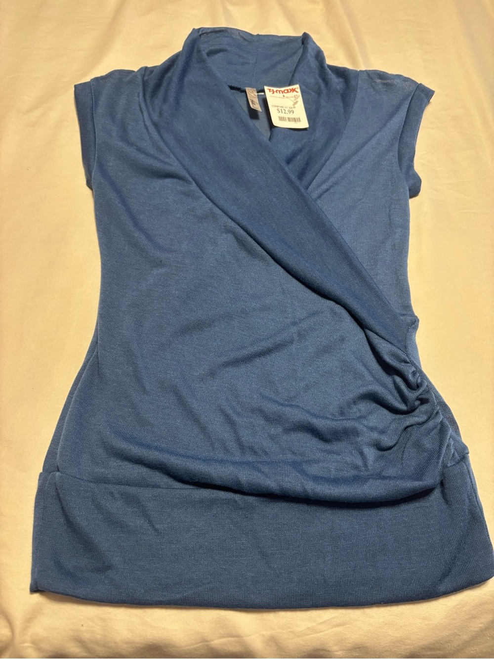 Women’s Bella D navy blue cap sleeve cross over top